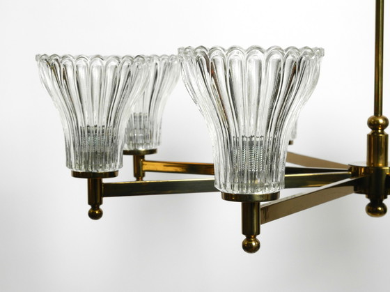 Image 1 of Beautiful large 1960s 8-arm brass chandelier with glass shades | by Kaiser Leuchten | Ø 76 cm | 29.9"