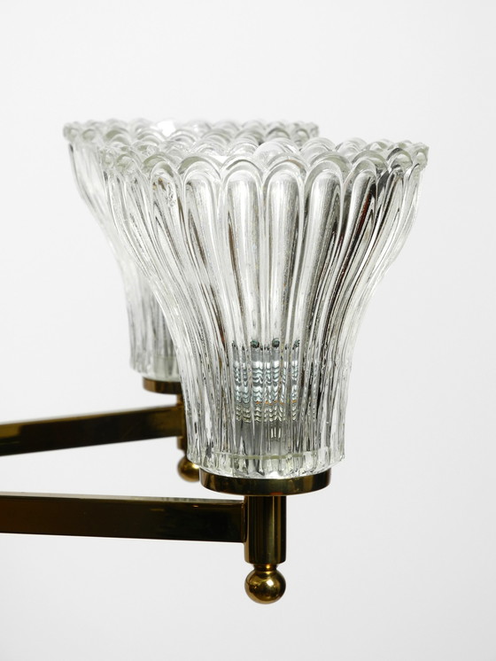 Image 1 of Beautiful large 1960s 8-arm brass chandelier with glass shades | by Kaiser Leuchten | Ø 76 cm | 29.9"