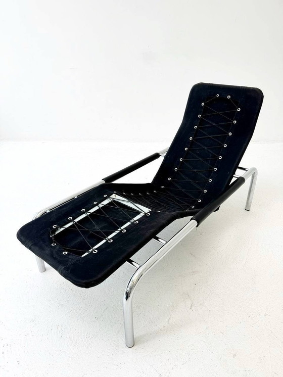 Image 1 of Designer lounger in black leather with tubular metal frame