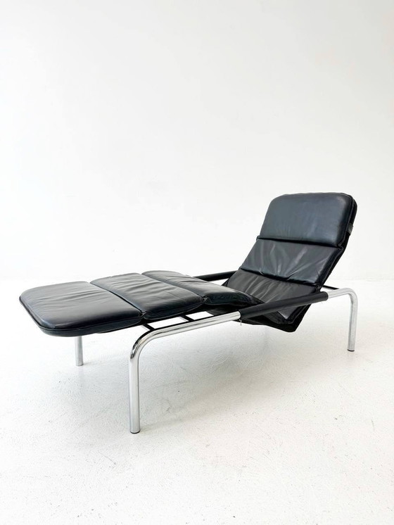 Image 1 of Designer lounger in black leather with tubular metal frame