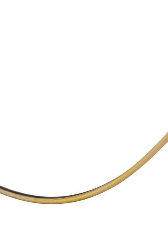 Image 1 of Oval-shaped mirror set with a gilded brass rod. Circa 1970.