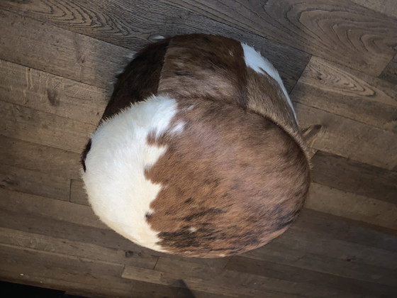 Image 1 of Vintage cowhide ottoman