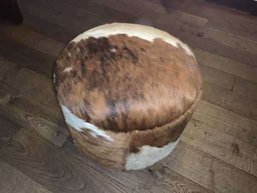 Vintage cowhide ottoman