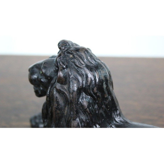 Image 1 of Vintage cast iron lying lion