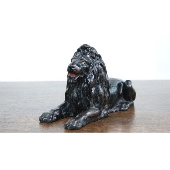 Image 1 of Vintage cast iron lying lion