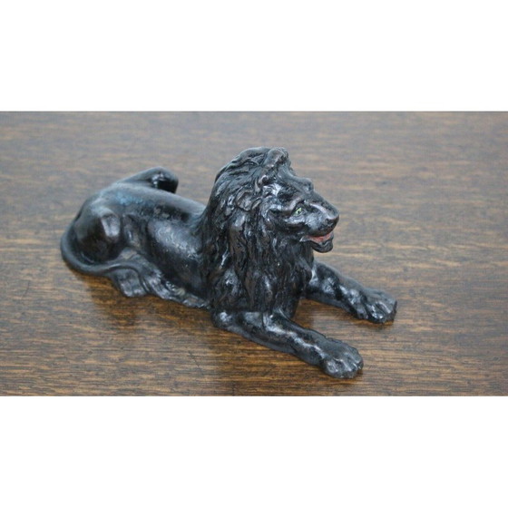 Image 1 of Vintage cast iron lying lion
