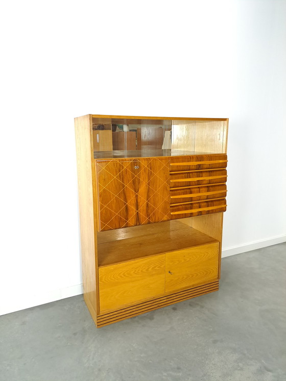 Image 1 of Veneer bar cabinet with round shapes and mirror wall