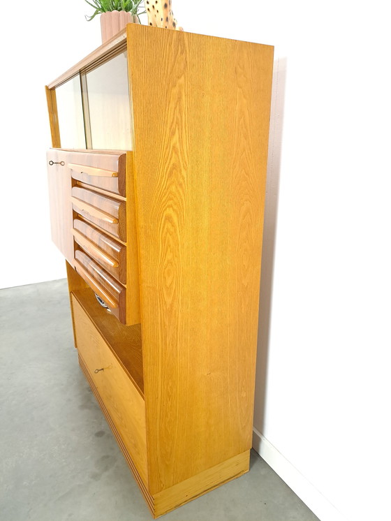 Image 1 of Veneer bar cabinet with round shapes and mirror wall