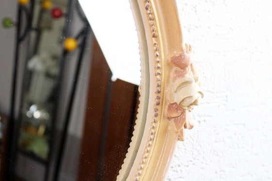 Image 1 of Round mirror with floral decor