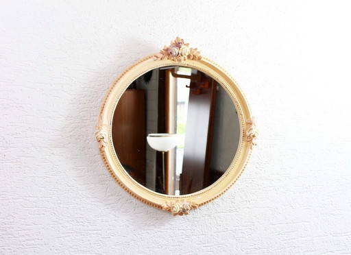 Miroir rond à décor floral