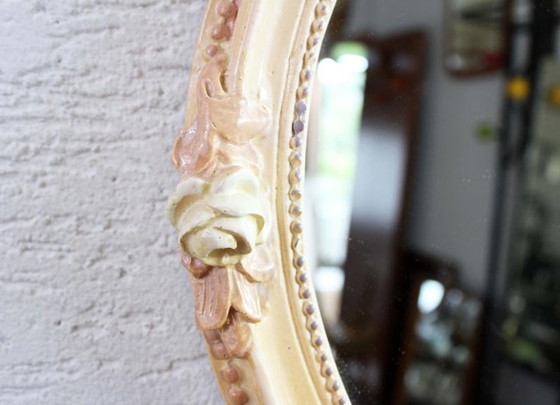 Image 1 of Round mirror with floral decor