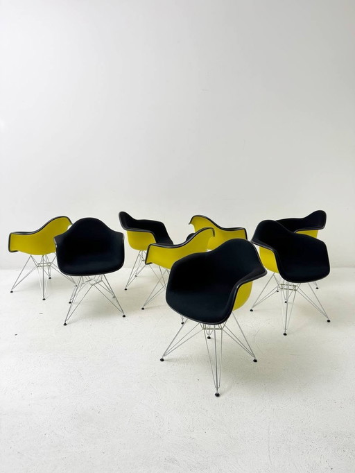 Set of 9 Vitra Eames Plastic Armchair Dar with full upholstery