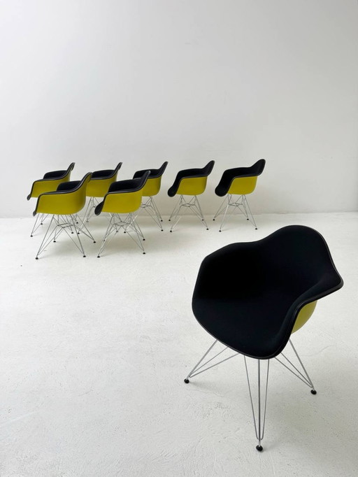 Set of 9 Vitra Eames Plastic Armchair Dar with full upholstery