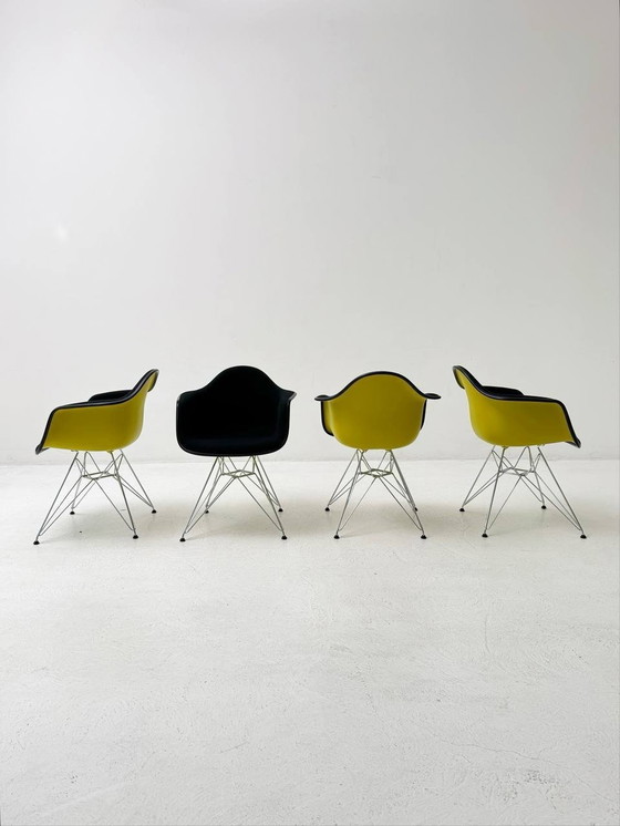 Image 1 of Set of 9 Vitra Eames Plastic Armchair Dar with full upholstery