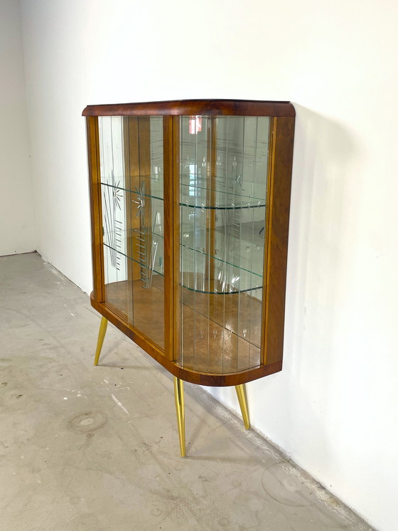 Image 1 of display case with wood finish in art deco style