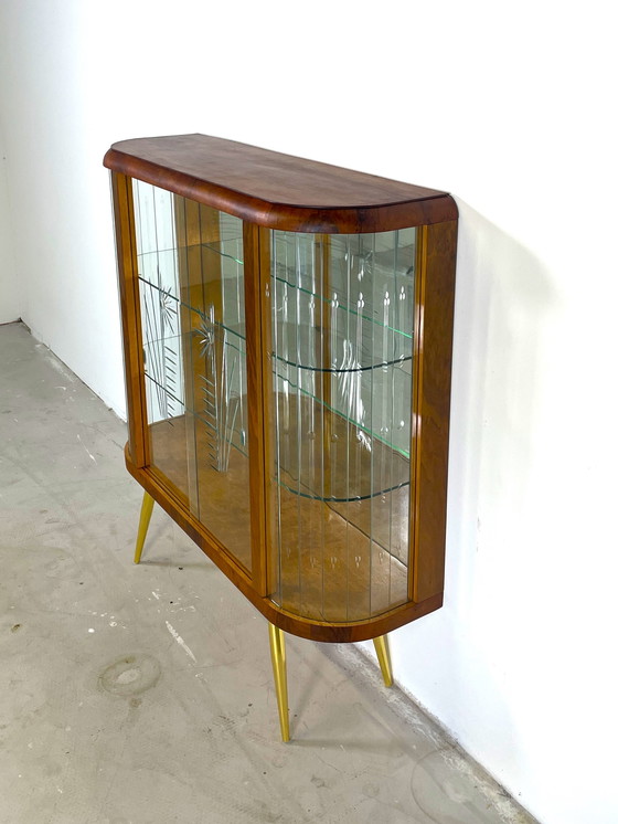 Image 1 of display case with wood finish in art deco style