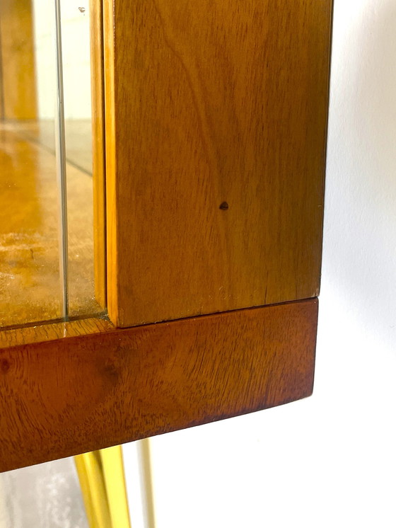 Image 1 of display case with wood finish in art deco style