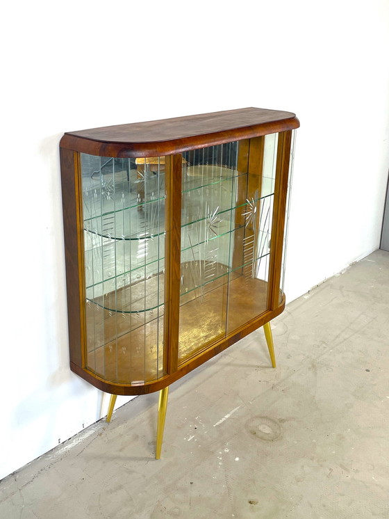 Image 1 of display case with wood finish in art deco style