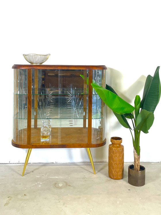 Image 1 of display case with wood finish in art deco style