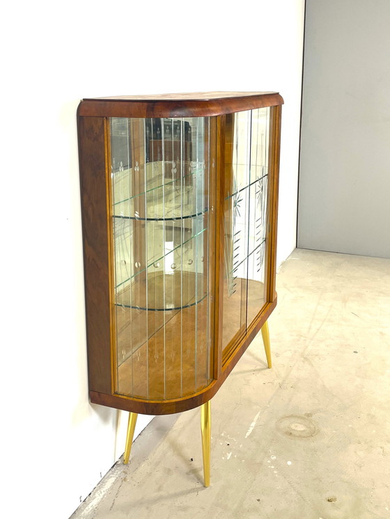 Image 1 of display case with wood finish in art deco style