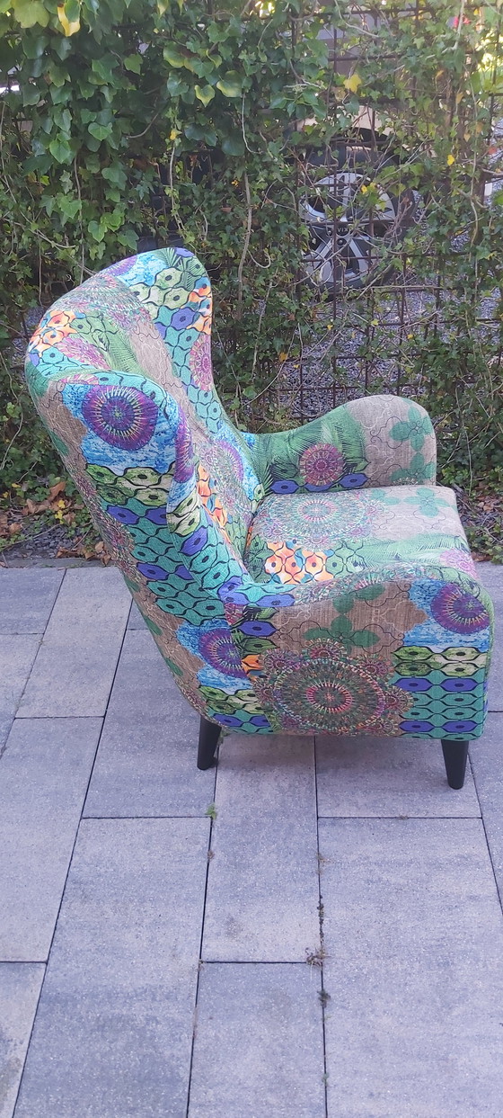 Image 1 of Dutch Seating Company Moor armchair with footstool.