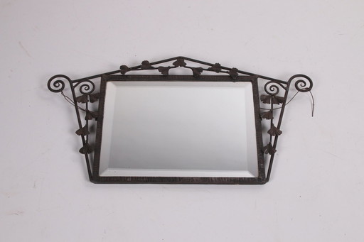 Art deco mirror with metal floral edge from 1920s