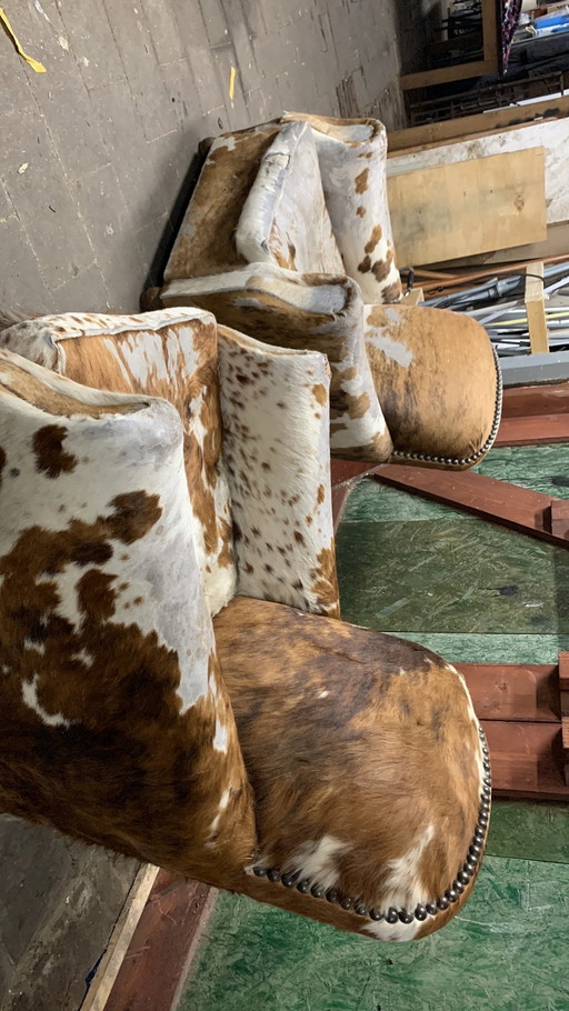 Two French Cowhide Armchairs, Original 1920s. Charming, But With Considerable Wear.