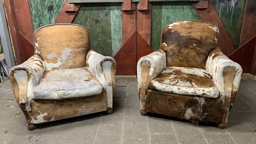 Two French Cowhide Armchairs, Original 1920s. Charming, But With Considerable Wear.