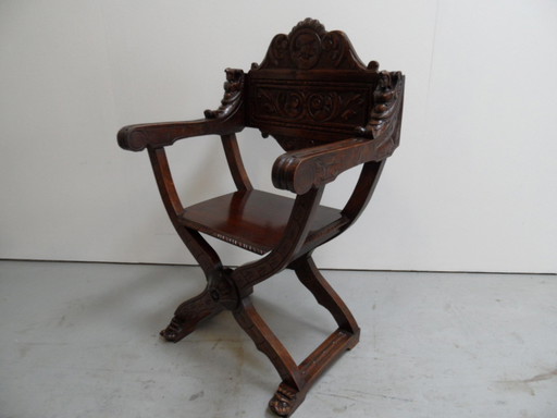 Antique armchair cross legged