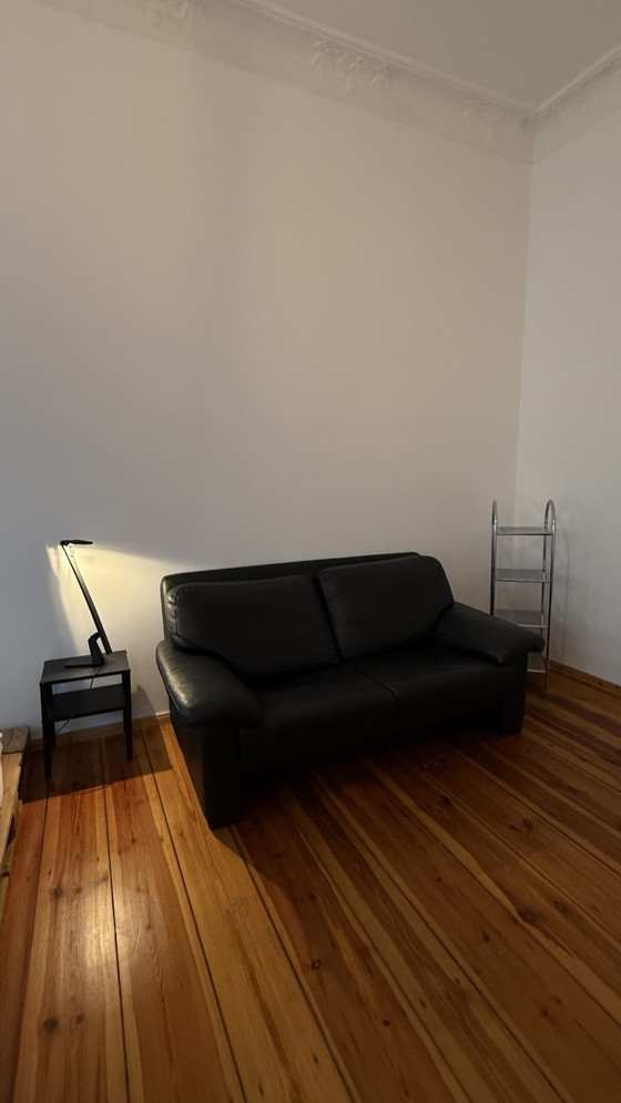 Image 1 of Black Leather Sofa / Two Seater