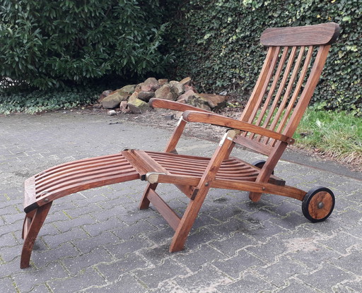 Summer Garden teak deckchairs with wheels, collapsible