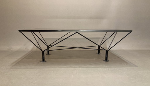 Design coffee table in glass and metal.