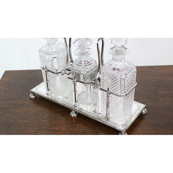 Image 1 of Vintage Victorian Silver Tantalus 3 Bottle Decanter Set