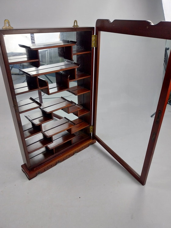 Image 1 of Chinese wall cabinet display cabinet with mirror.