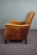 Fauteuil classique en cuir de vachette