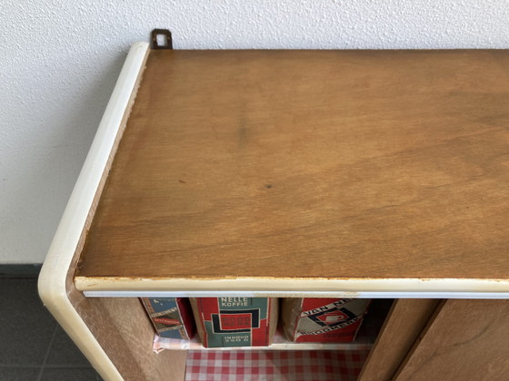 Image 1 of Vintage wall cabinet with sliding doors