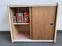 Vintage wall cabinet with sliding doors