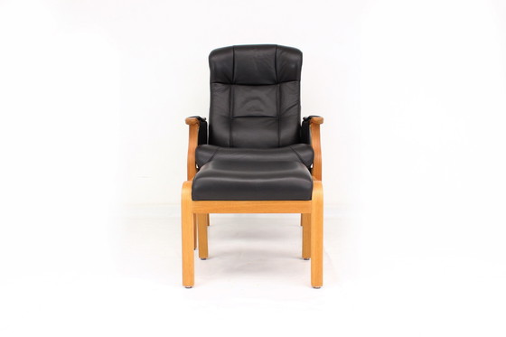 Image 1 of as new, 1 of 2 danish Nordic Easy Lounge Chair / Relax Sessel with stool in oak and leather.