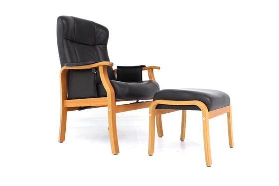 Image 1 of as new, 1 of 2 danish Nordic Easy Lounge Chair / Relax Sessel with stool in oak and leather.