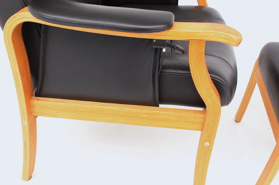 Image 1 of as new, 1 of 2 danish Nordic Easy Lounge Chair / Relax Sessel with stool in oak and leather.