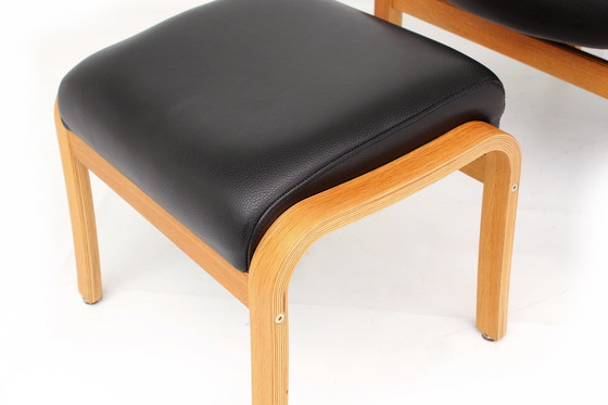 Image 1 of as new, 1 of 2 danish Nordic Easy Lounge Chair / Relax Sessel with stool in oak and leather.