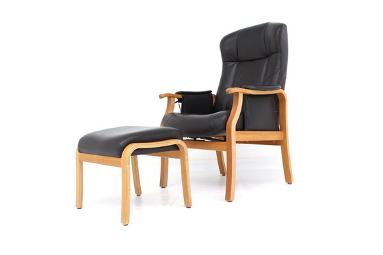 Image 1 of as new, 1 of 2 danish Nordic Easy Lounge Chair / Relax Sessel with stool in oak and leather.