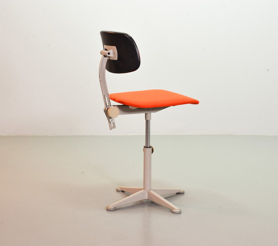 Image 1 of Ahrend De Cirkel industrial office chair with orange fabric upholstery on a gray steel frame. Netherlands, 1950s. Ref.: CH19