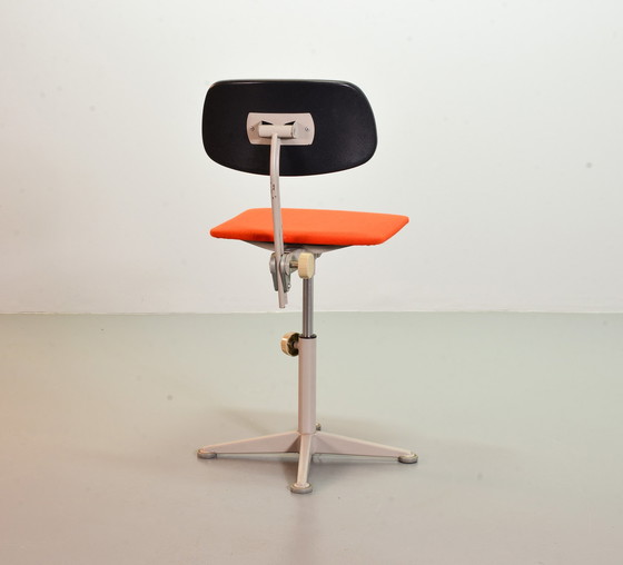 Image 1 of Ahrend De Cirkel industrial office chair with orange fabric upholstery on a gray steel frame. Netherlands, 1950s. Ref.: CH19