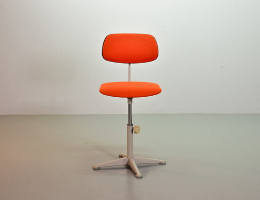 Ahrend De Cirkel industrial office chair with orange fabric upholstery on a gray steel frame. Netherlands, 1950s. Ref.: CH19