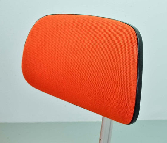 Image 1 of Ahrend De Cirkel industrial office chair with orange fabric upholstery on a gray steel frame. Netherlands, 1950s. Ref.: CH19