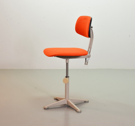 Image 1 of Ahrend De Cirkel industrial office chair with orange fabric upholstery on a gray steel frame. Netherlands, 1950s. Ref.: CH19