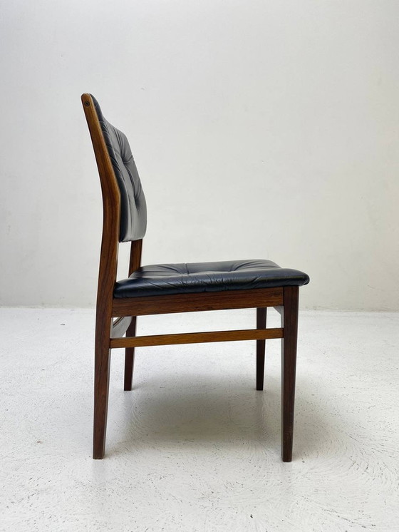 Image 1 of Elegant wooden chair with dark blue leather upholstery