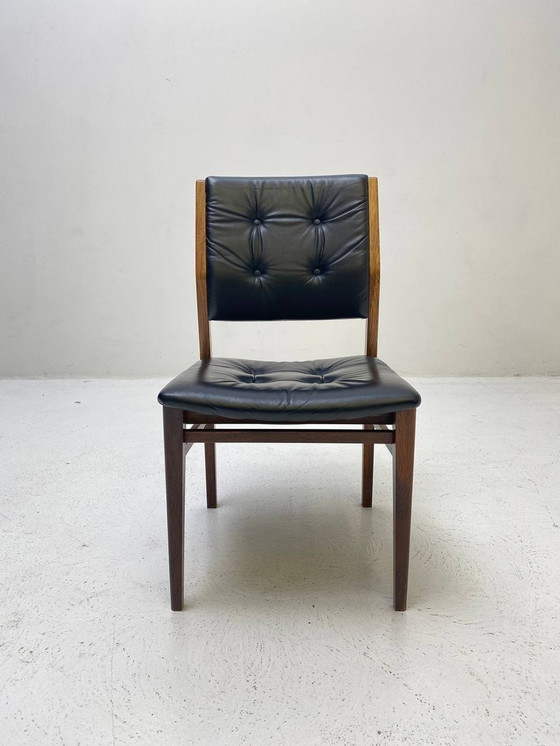 Image 1 of Elegant wooden chair with dark blue leather upholstery