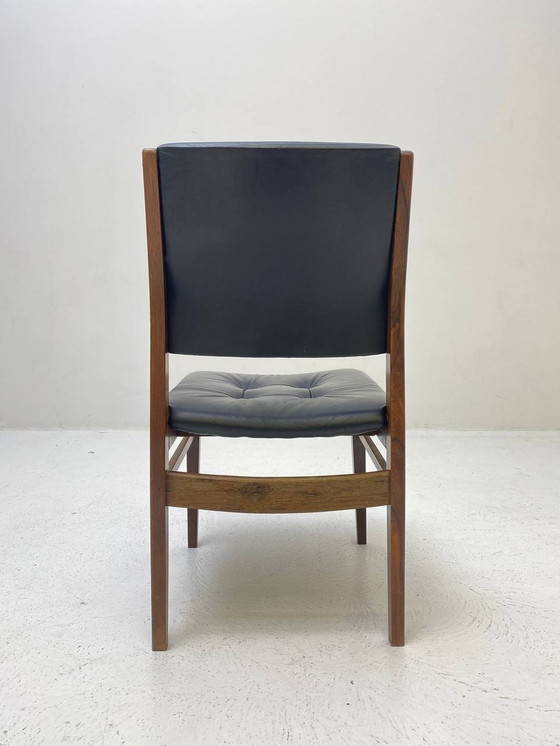 Image 1 of Elegant wooden chair with dark blue leather upholstery